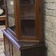 Vintage two-body display cabinet in oak from the 1950s.