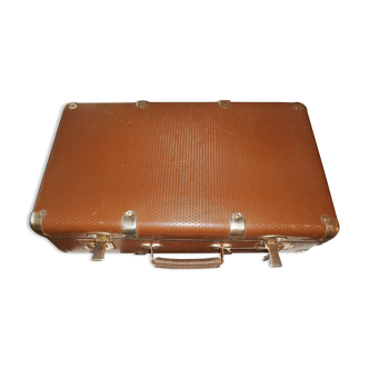 Old suitcase with keys
