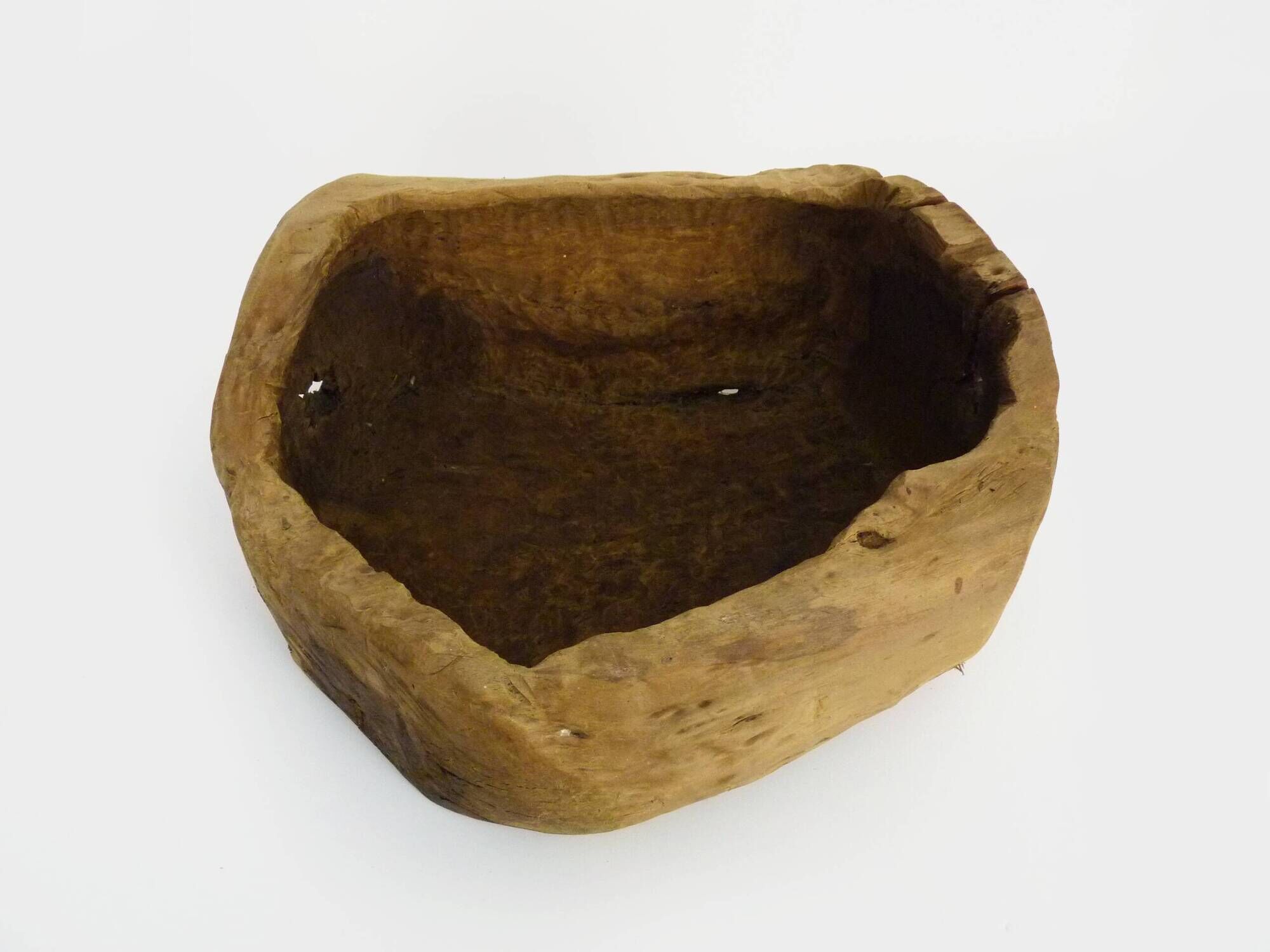 Old wooden farm water trough. Centerpiece, floral decoration. 1950