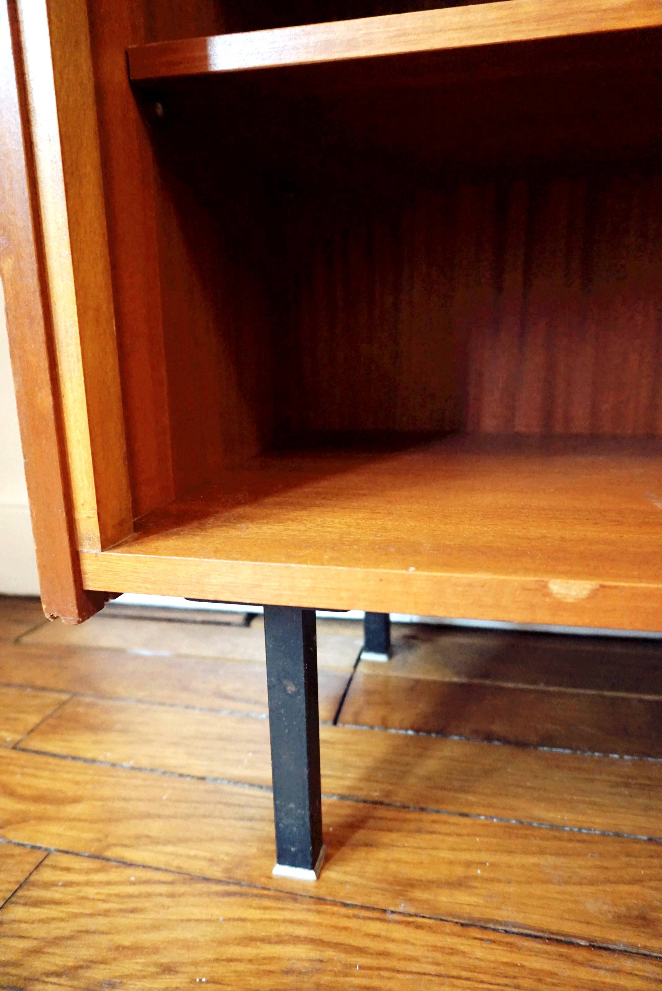 Vintage bookcase with metal feet