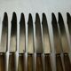 Set of 12 large knives and 11 horn and steel dessert knives