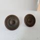 Pair of antique Empire furniture knobs from the 19th century.