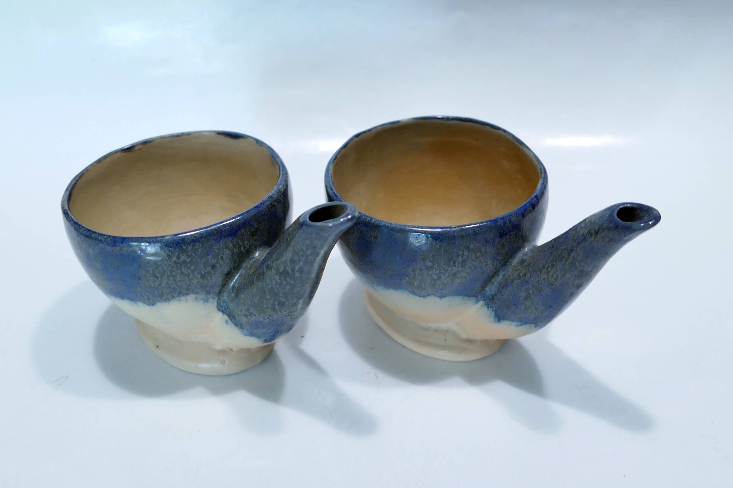 Pair of decorative ceramics in homage to René Magritte 1960-70s