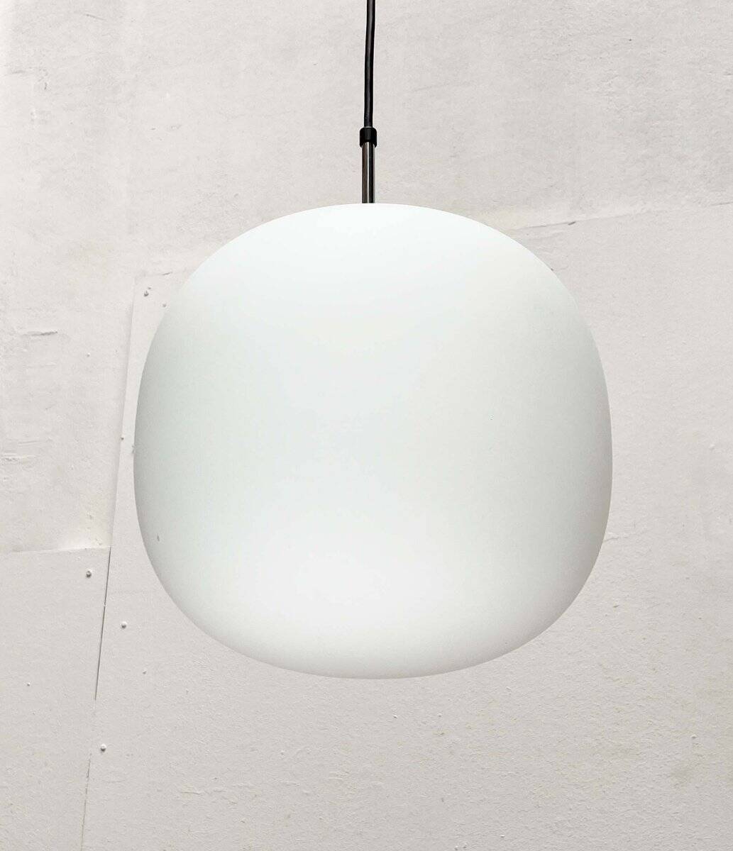 Minimalist suspended glass ball lamp from the vintage German space age by Glashütte Limburg, 1970s.