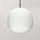 Minimalist suspended glass ball lamp from the vintage German space age by Glashütte Limburg, 1970s.