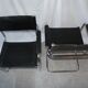 Paire de fauteuils type B34