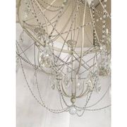 Contemporary ivory florentine iron and crystals chandelier