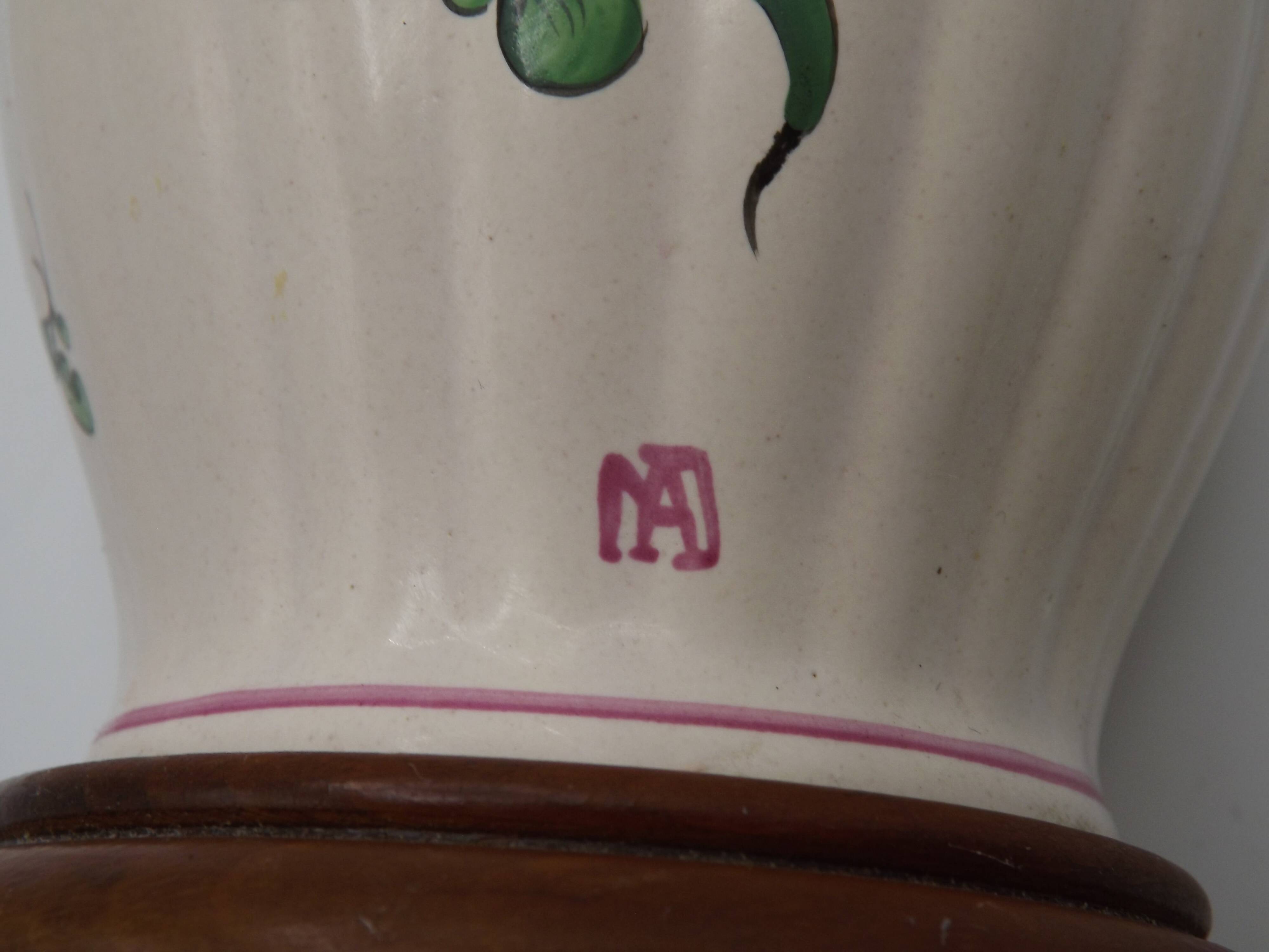 Pretty French vintage hand-painted ceramic floral lamp base on wooden plinth.