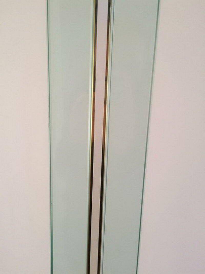 Floor lamp made of glass, brass and lacquered metal