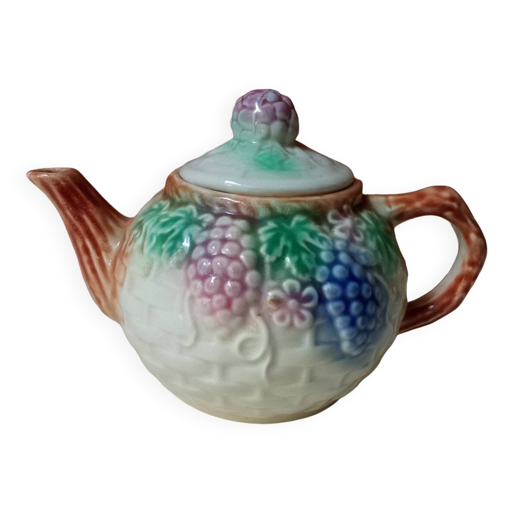 Antique teapot in slip