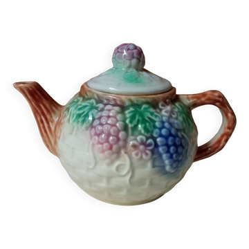 Antique teapot in slip