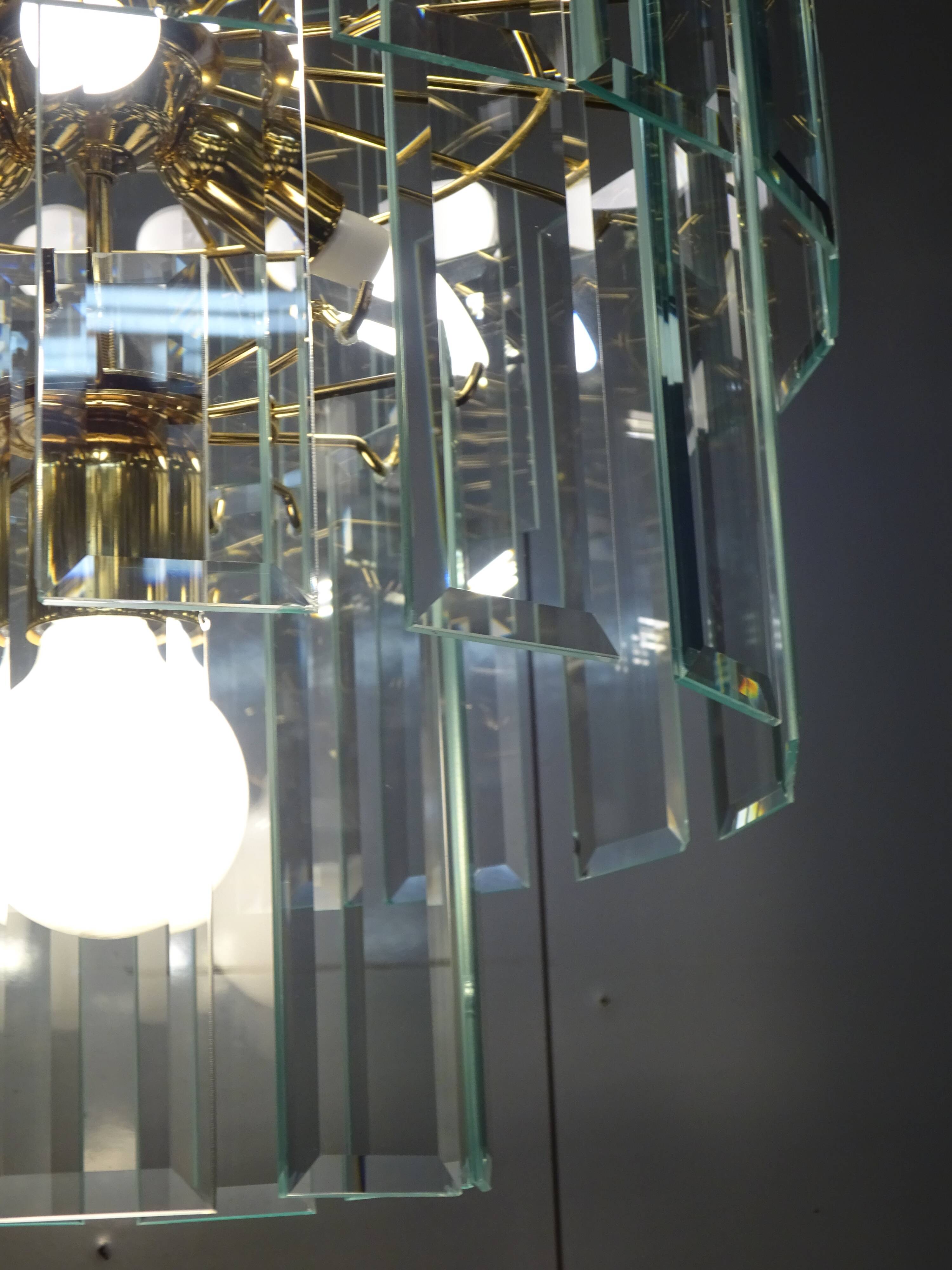 Brass chandelier and beveled glass, Italian manufacturing