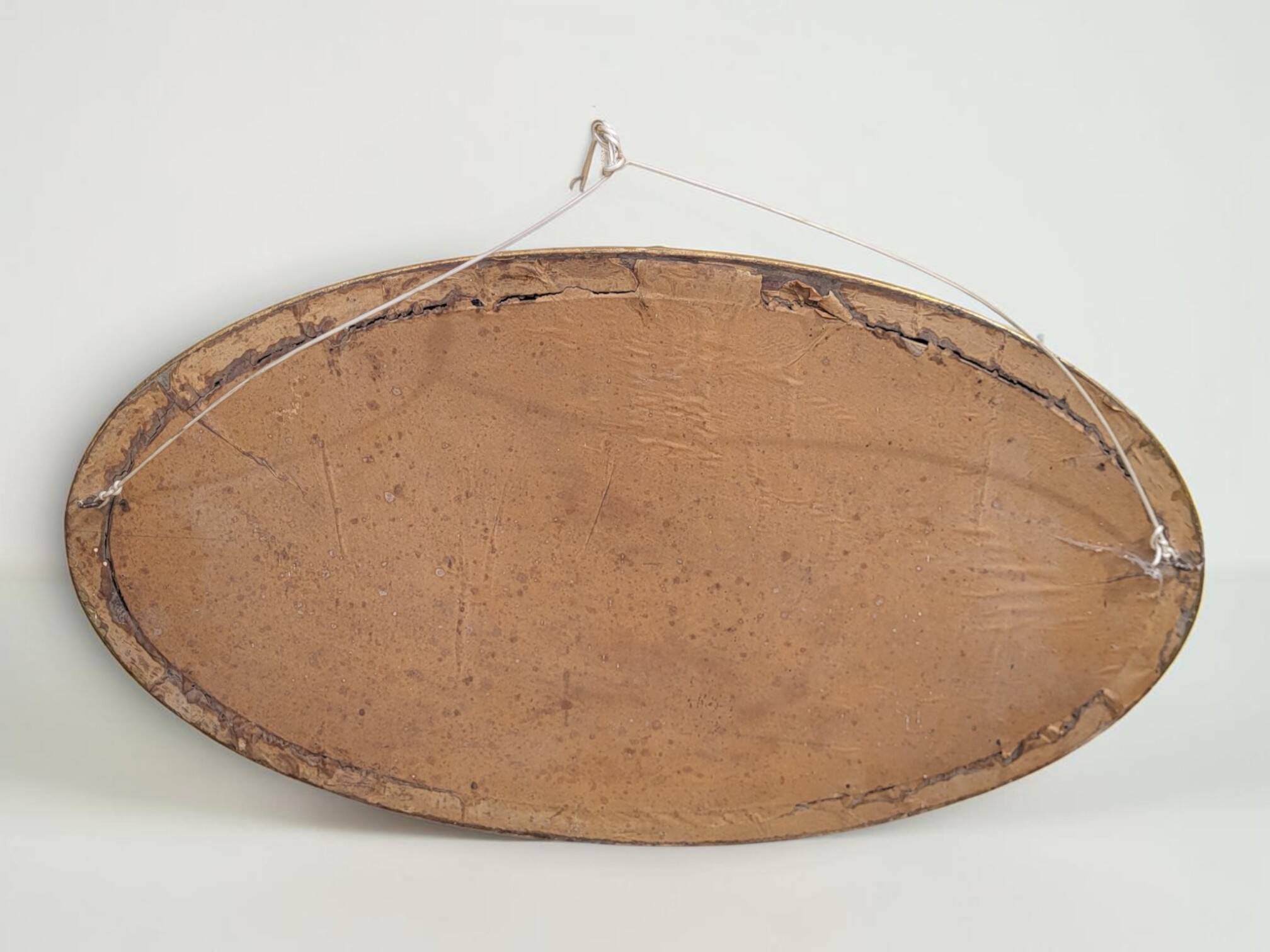 Miroir ovale en bois doré, style Louis XVI