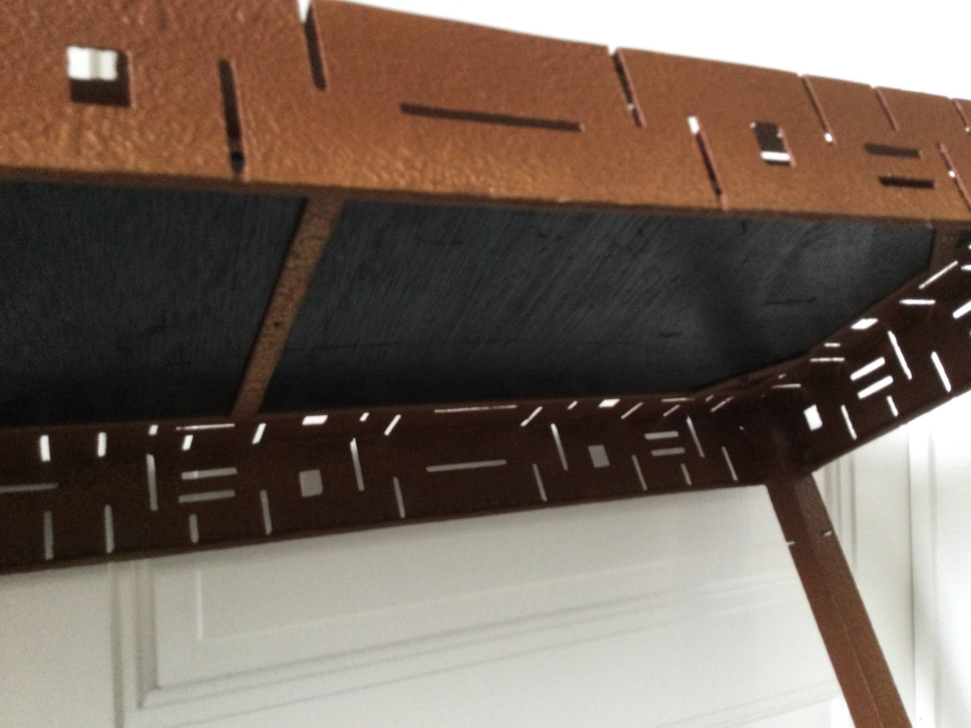 Perforated sheet metal and wood console