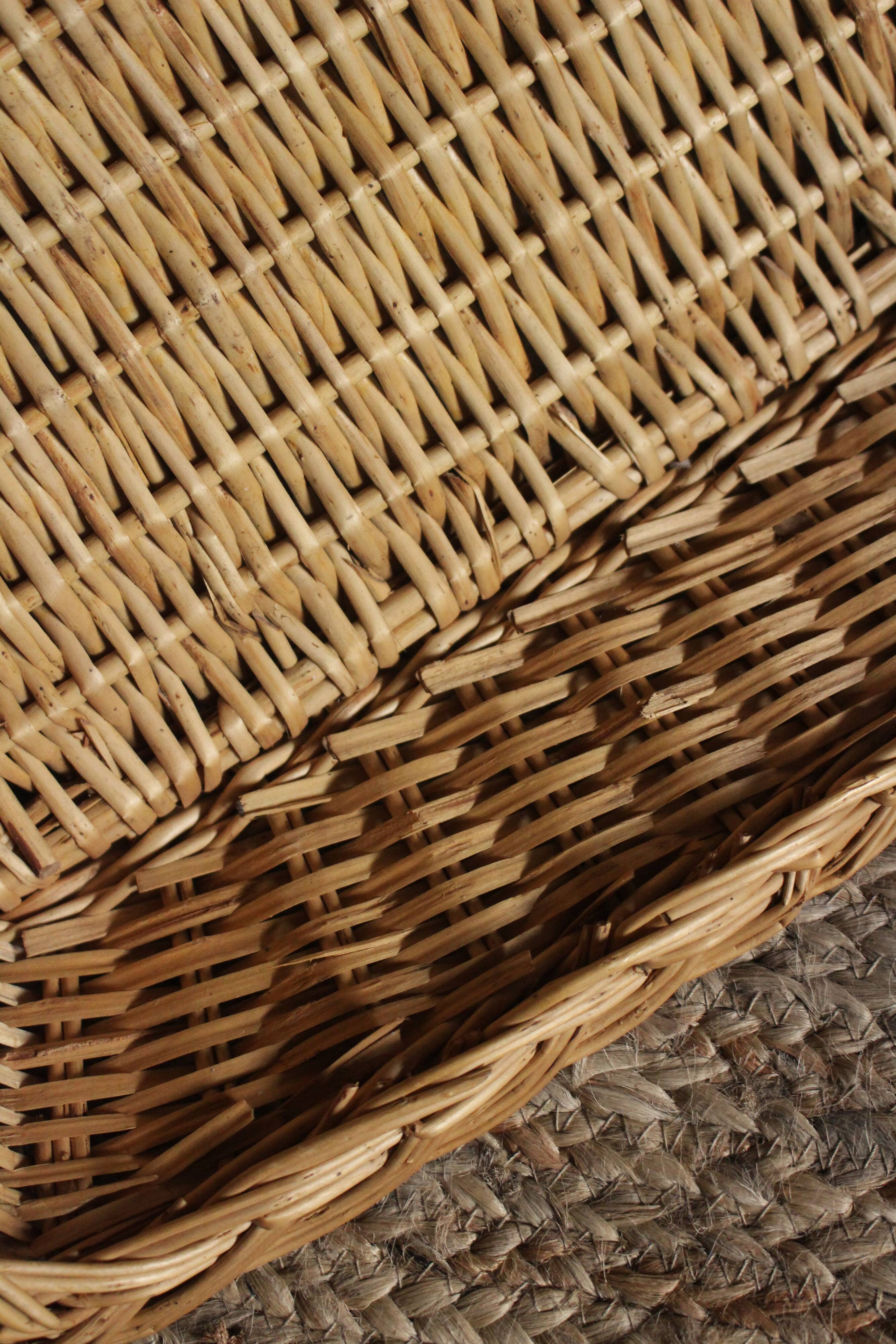 A large vintage rectangular wicker basket