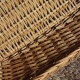 A large vintage rectangular wicker basket