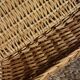 A large vintage rectangular wicker basket