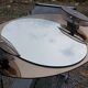 Oval mirror with 2 double tain sconces by Antonio Lupi from the 80s, 69x55 cm