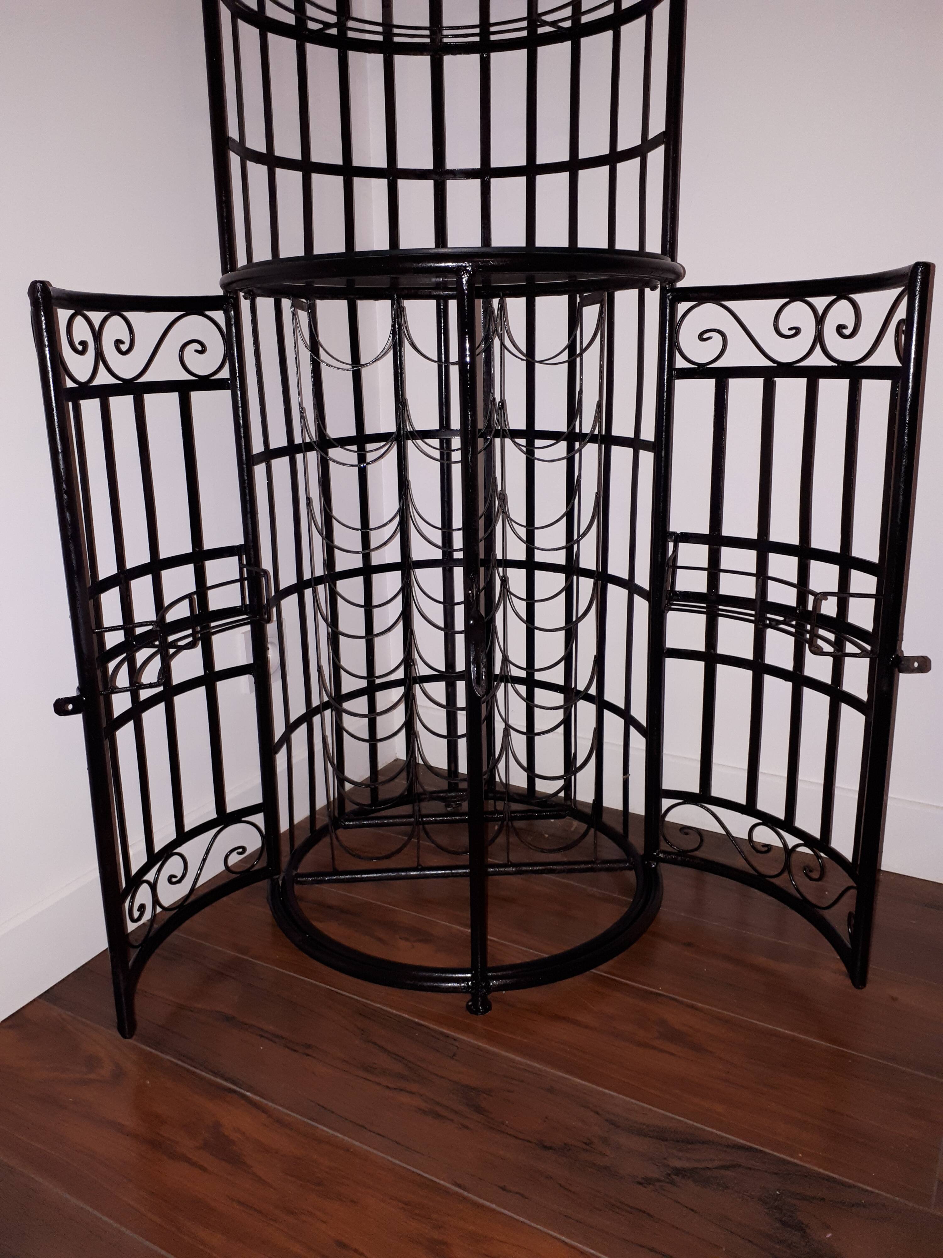 Wrought iron bar with bottles holder