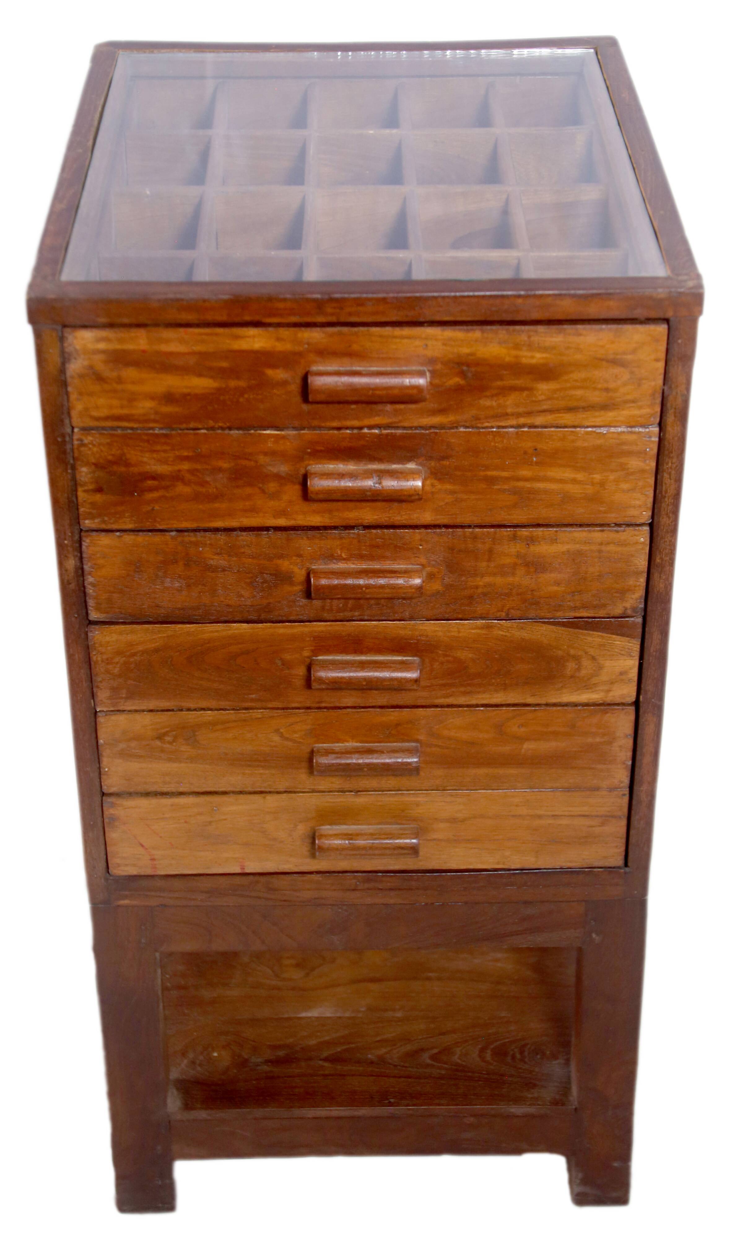 Former antique Burmese teak workshop cabinet with top glass tray