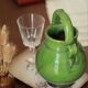 Old earthenware enamelled pitcher vase