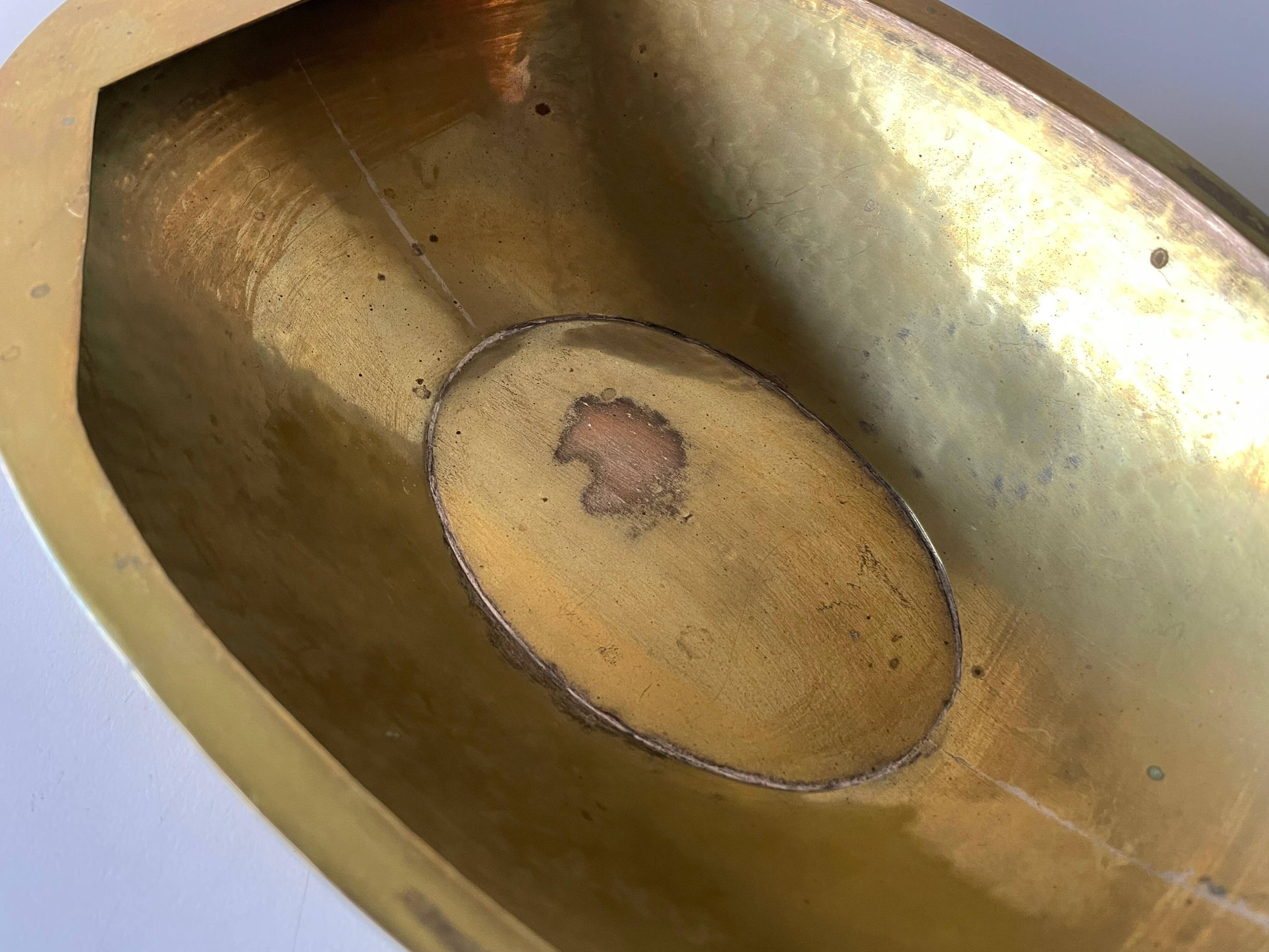 Decorative brass bowl with wooden handle, 1970s, Turin, Italy.
