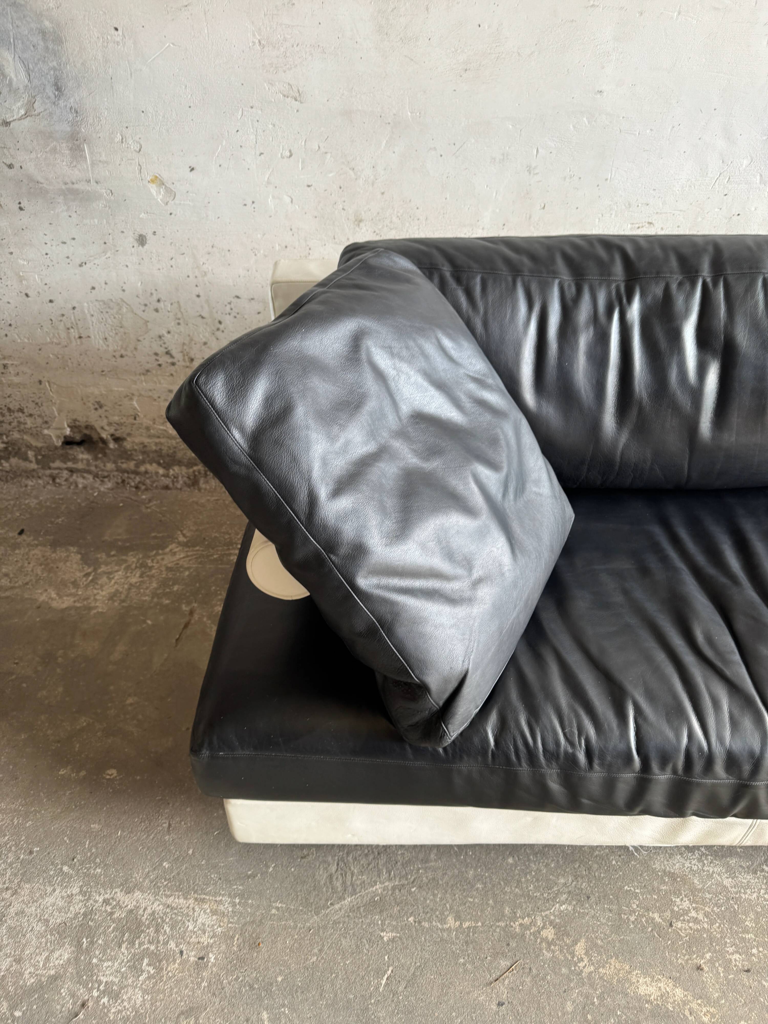 BnB Italia Sity 2-seater leather sofa — black seat with white leather base