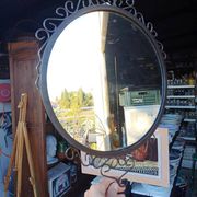 Vintage wrought iron round mirror