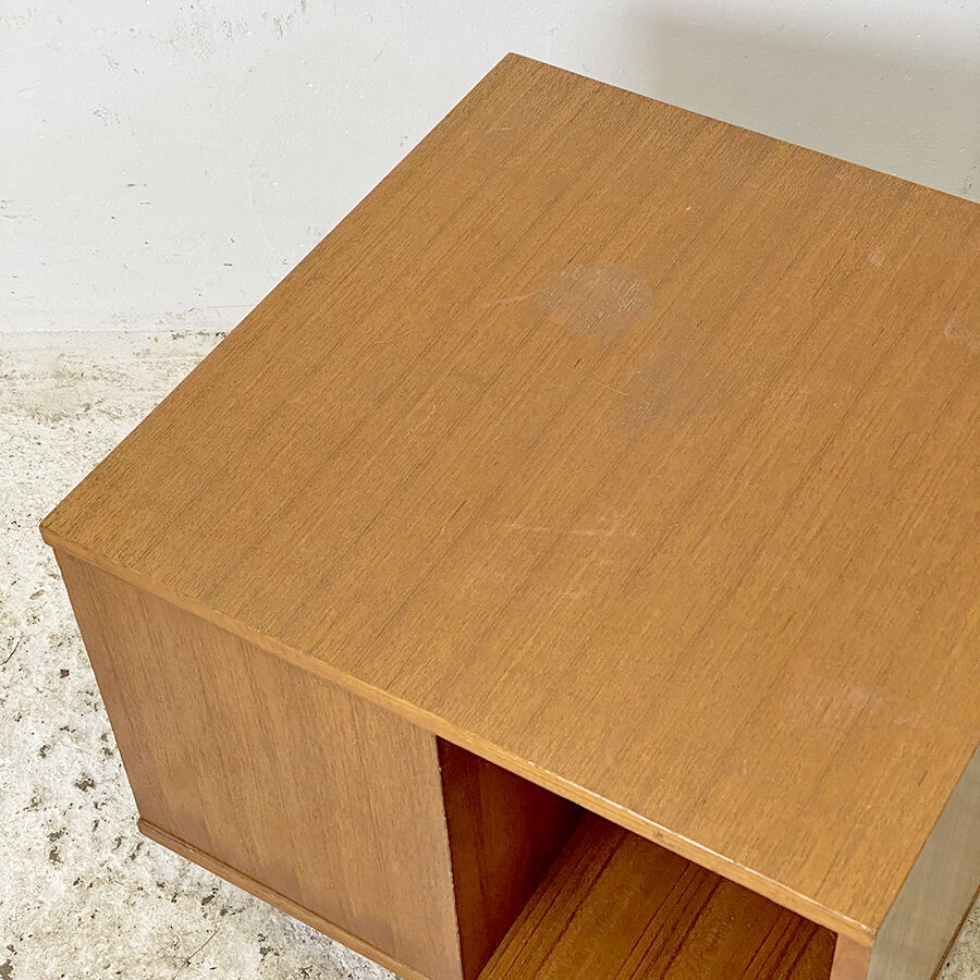 Rotating coffee table magazine holder