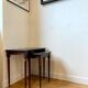 Dark wood and black leather tables