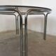 Round chrome and smoked glass coffee table