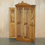 Vintage hand-carved wardrobe in Art Nouveau style.