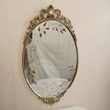 Gilded bronze mirror and screen-printed glass with flower motif