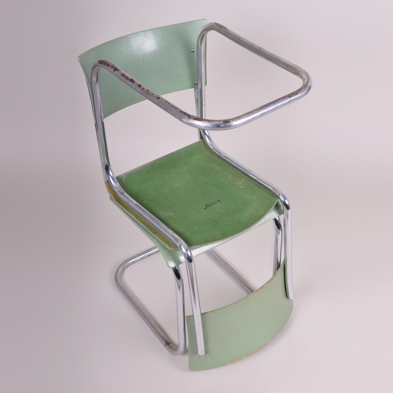 Pair of green Bauhaus chairs made in 1930s Czechia. Made by Robert Slezák