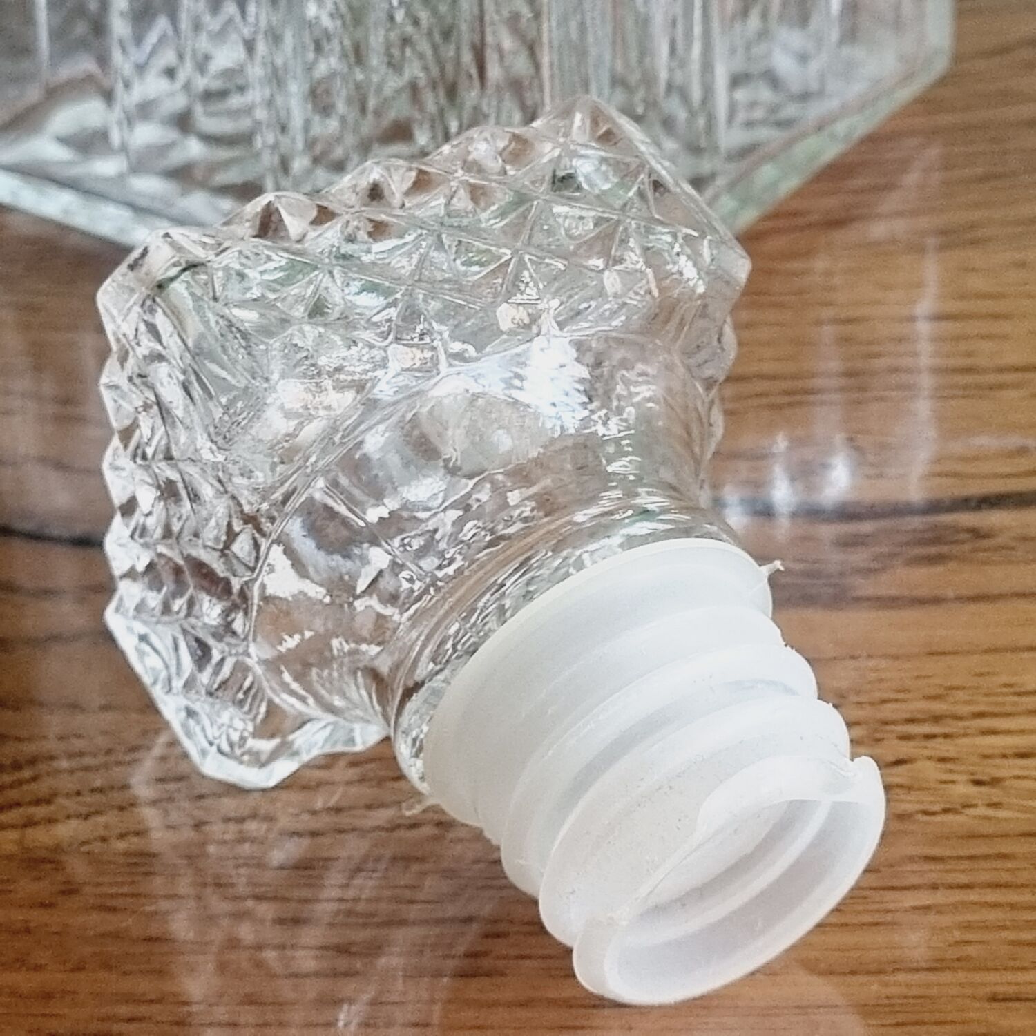 Stretched diamond-tipped glass decanter