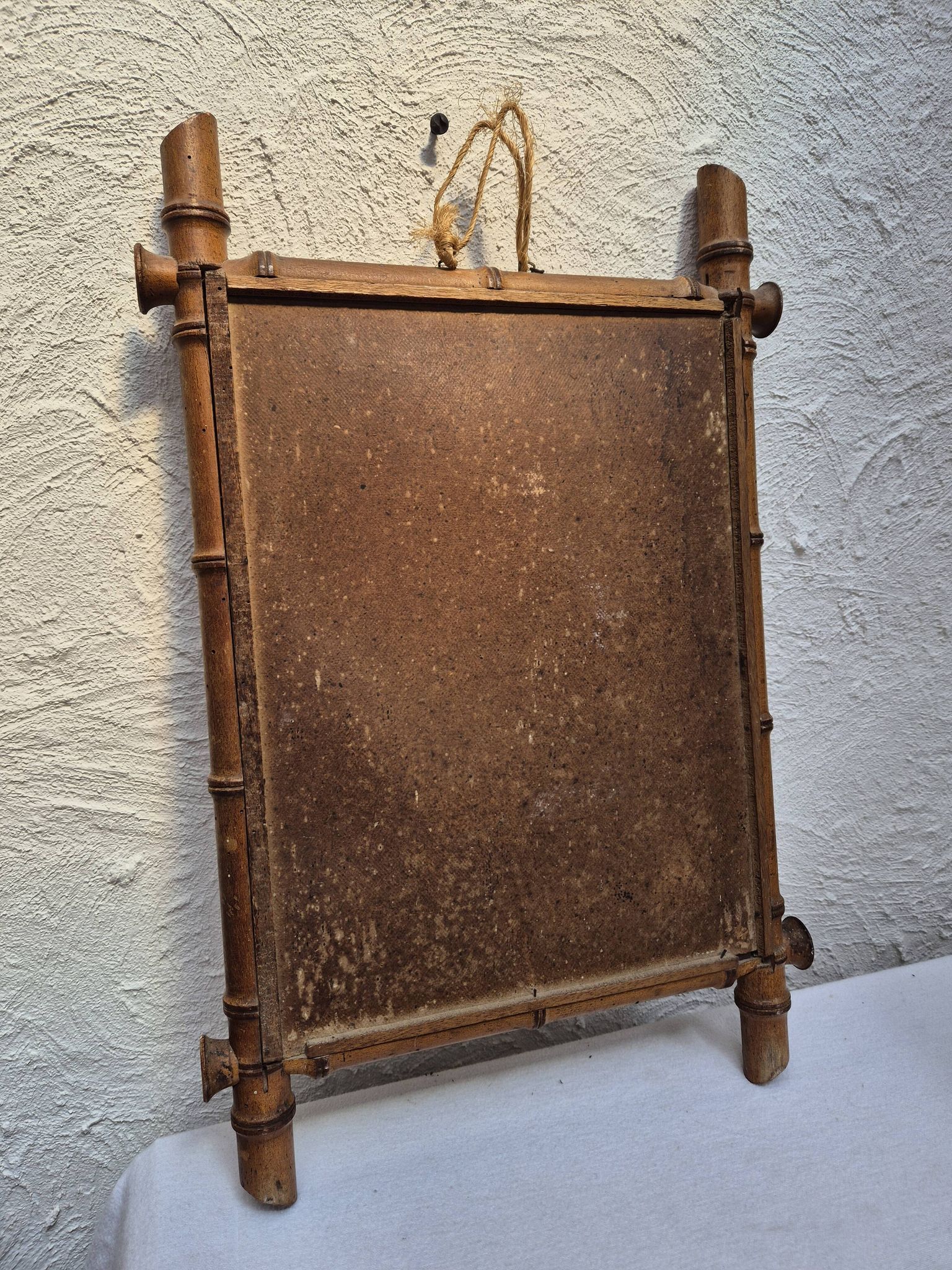 Vintage wooden mirror imitating bamboo