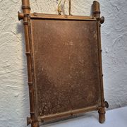 Vintage wooden mirror imitating bamboo