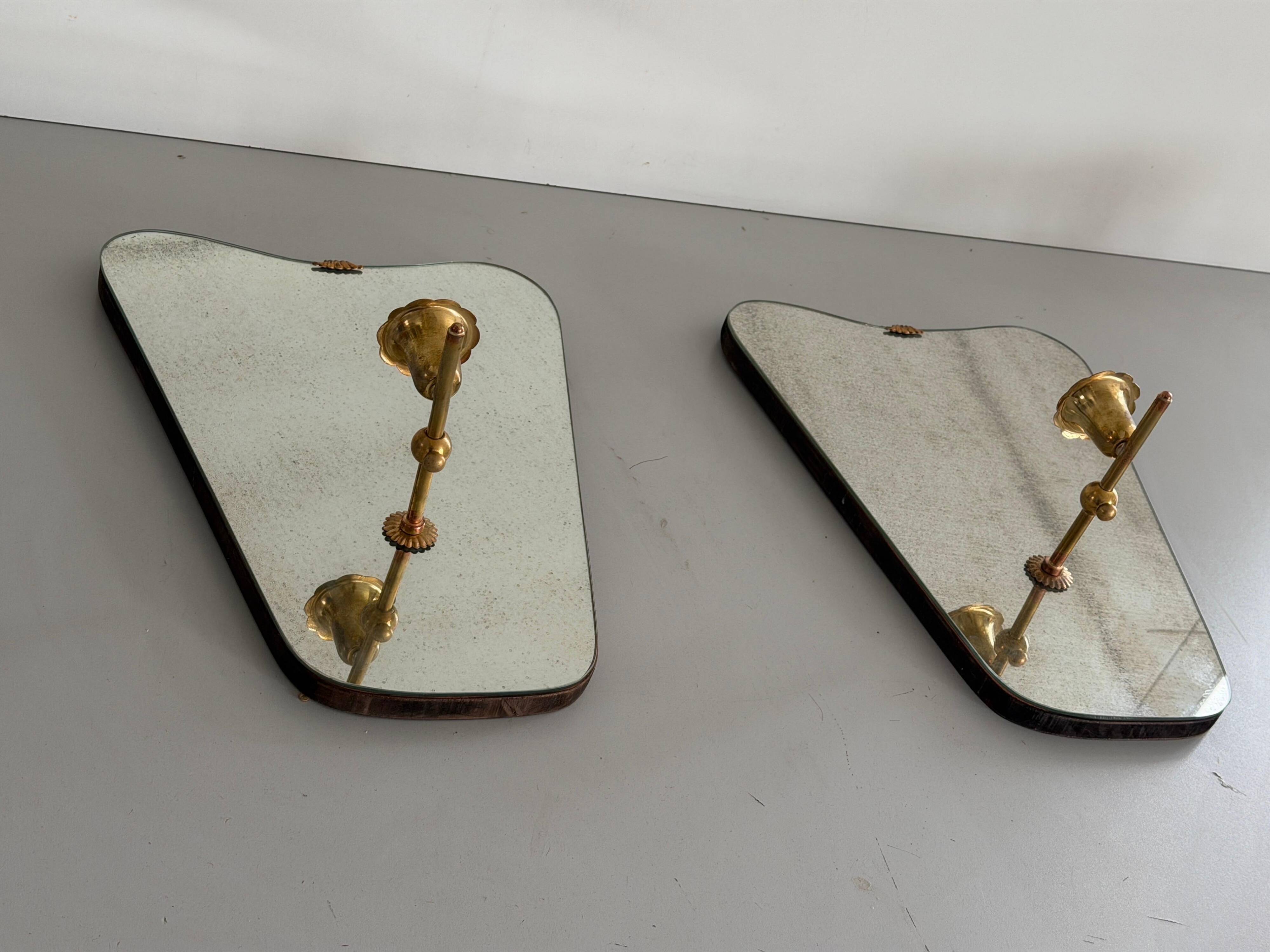 Pair of brass wall lights with mirrors, mid-20th century, Italy, 1960.