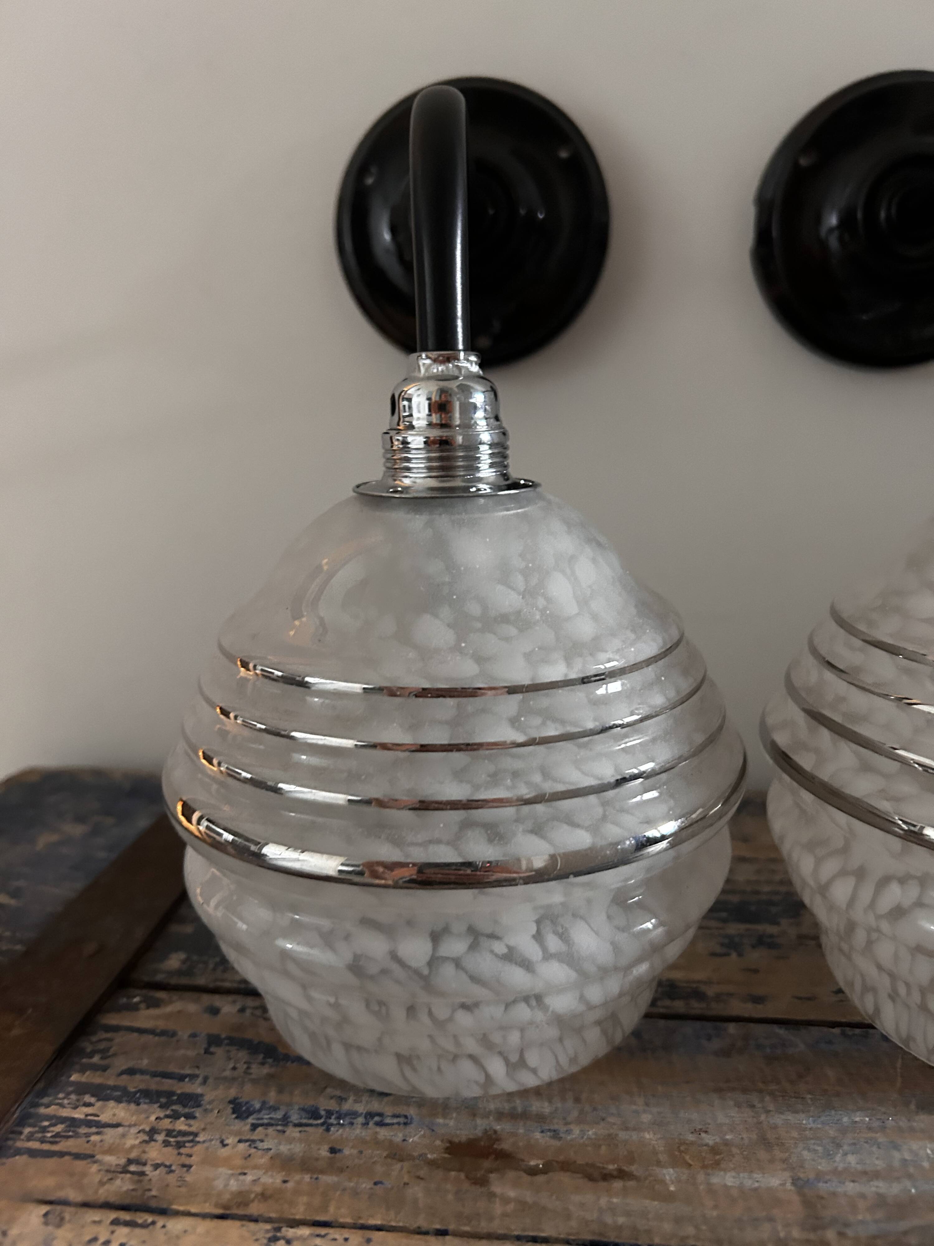 Pair of white, black and silver Art Deco wall lights