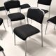 Grey steel chair and black fabric
