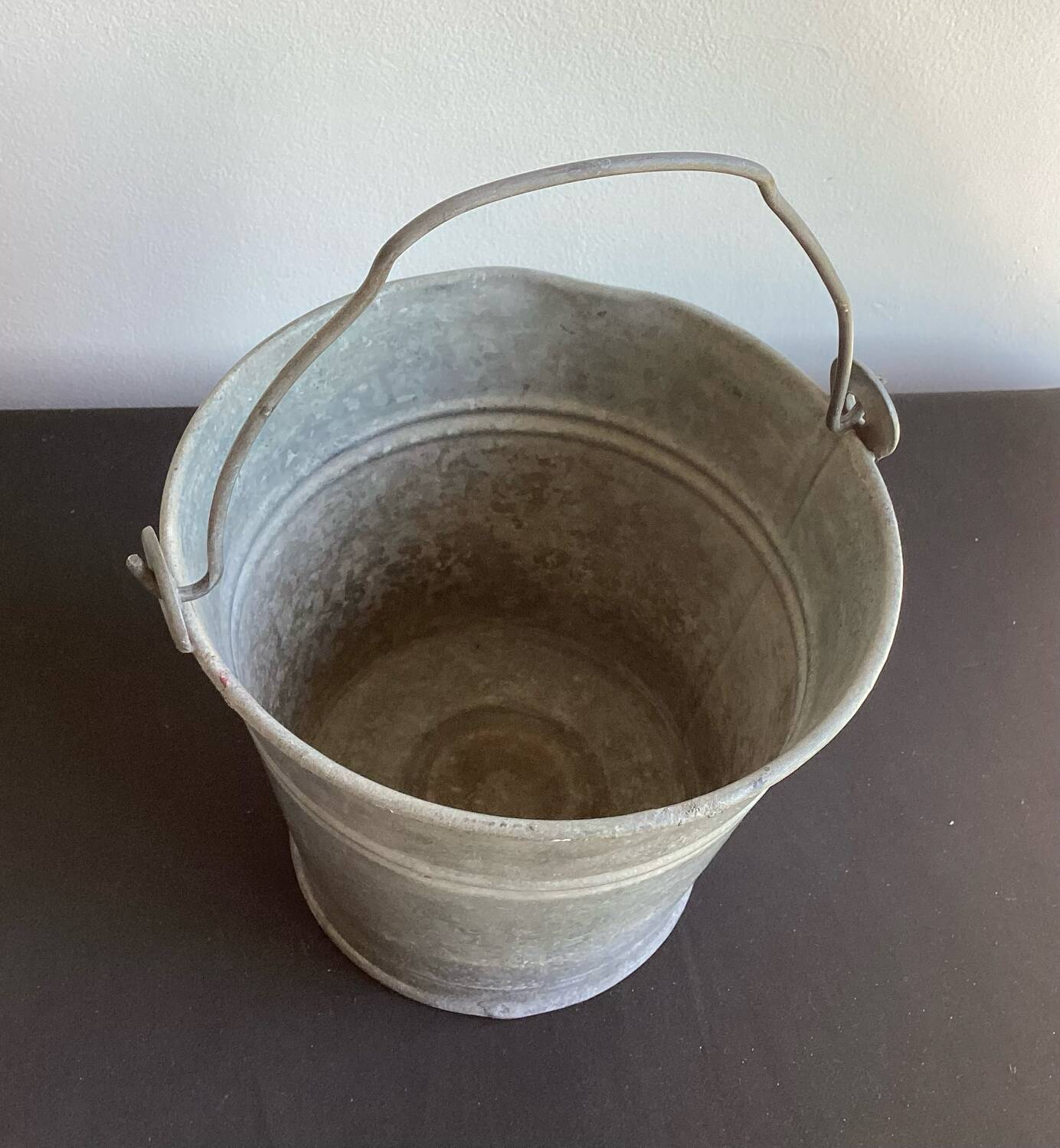 Old small galvanized steel bucket