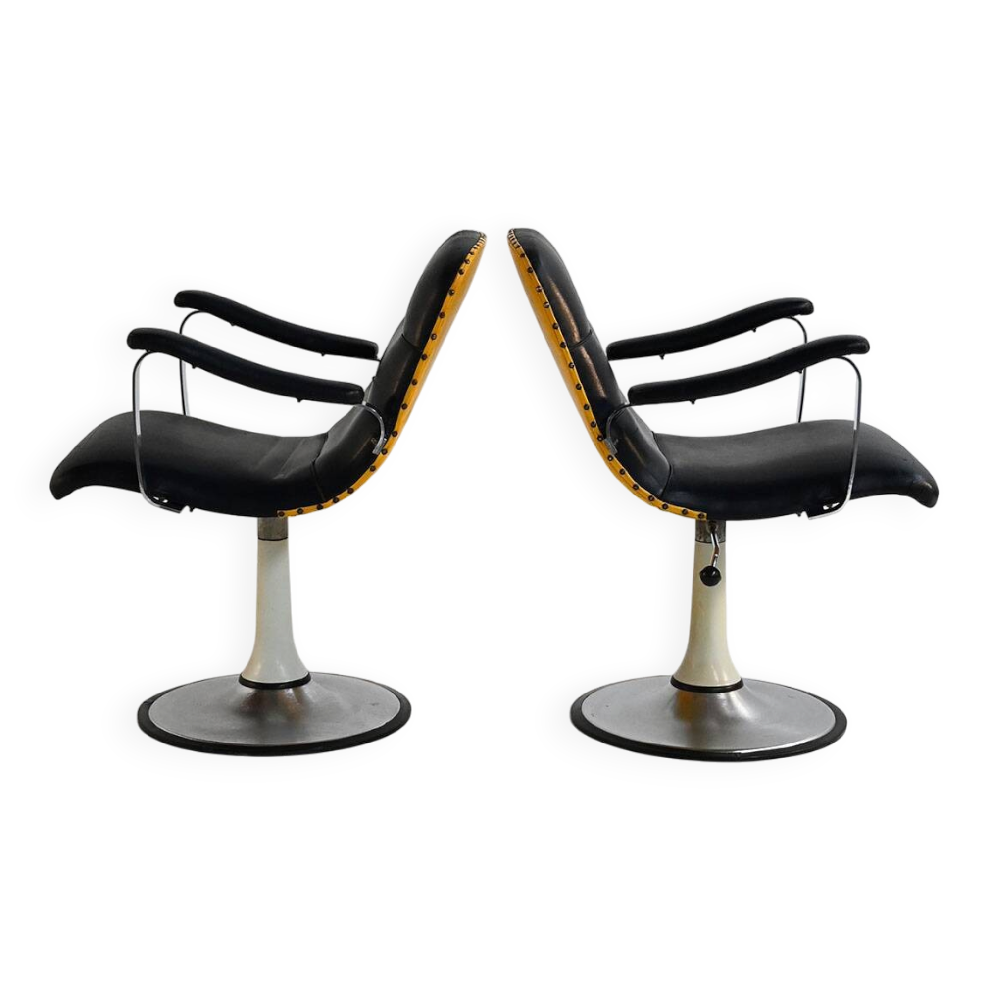 Pair of European 1970s swivel armchairs in faux leather and steel
