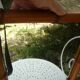 Antique turned wooden mirror in bamboo style H.47cm.