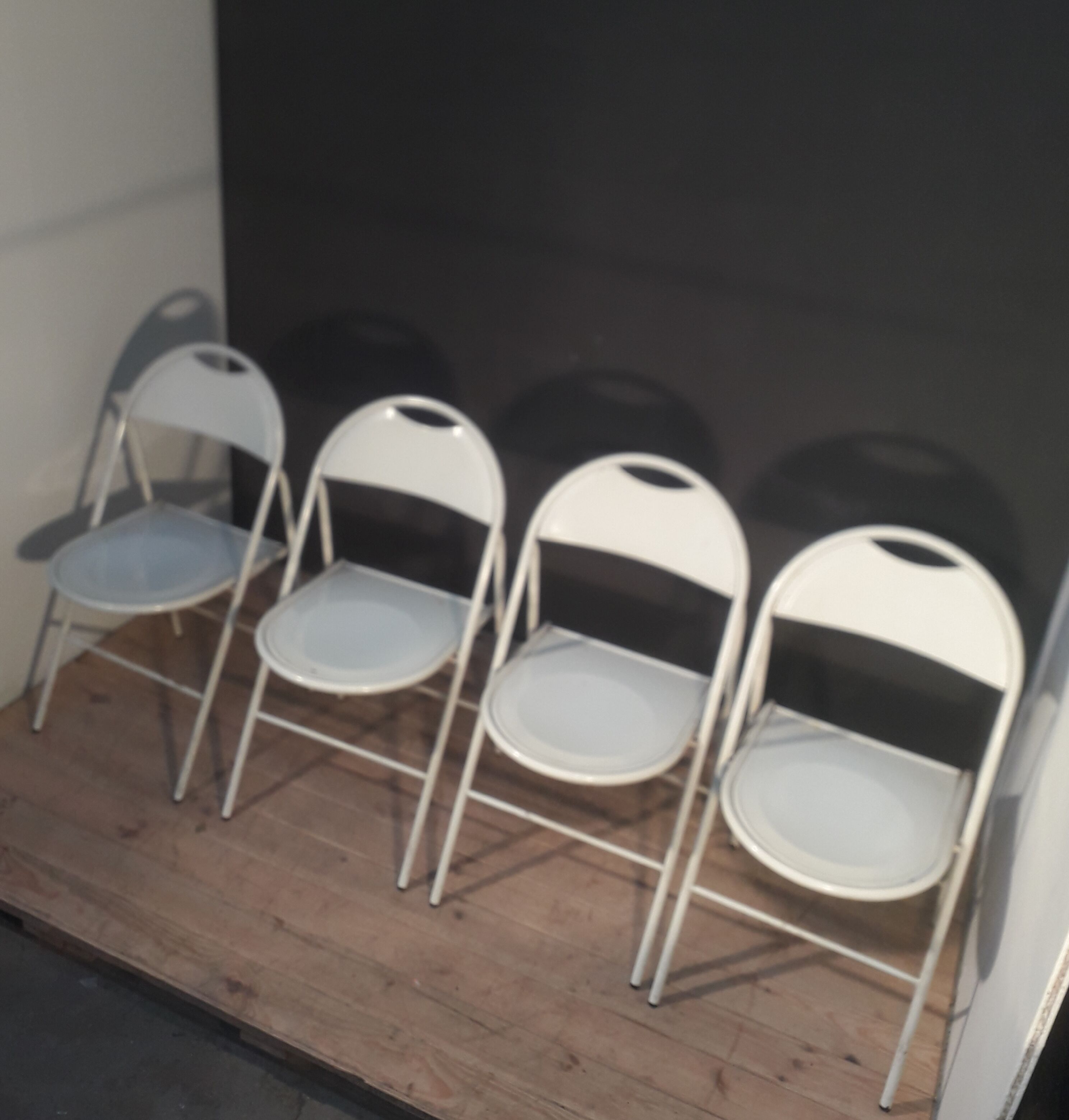 Series of 4 metal folding chairs