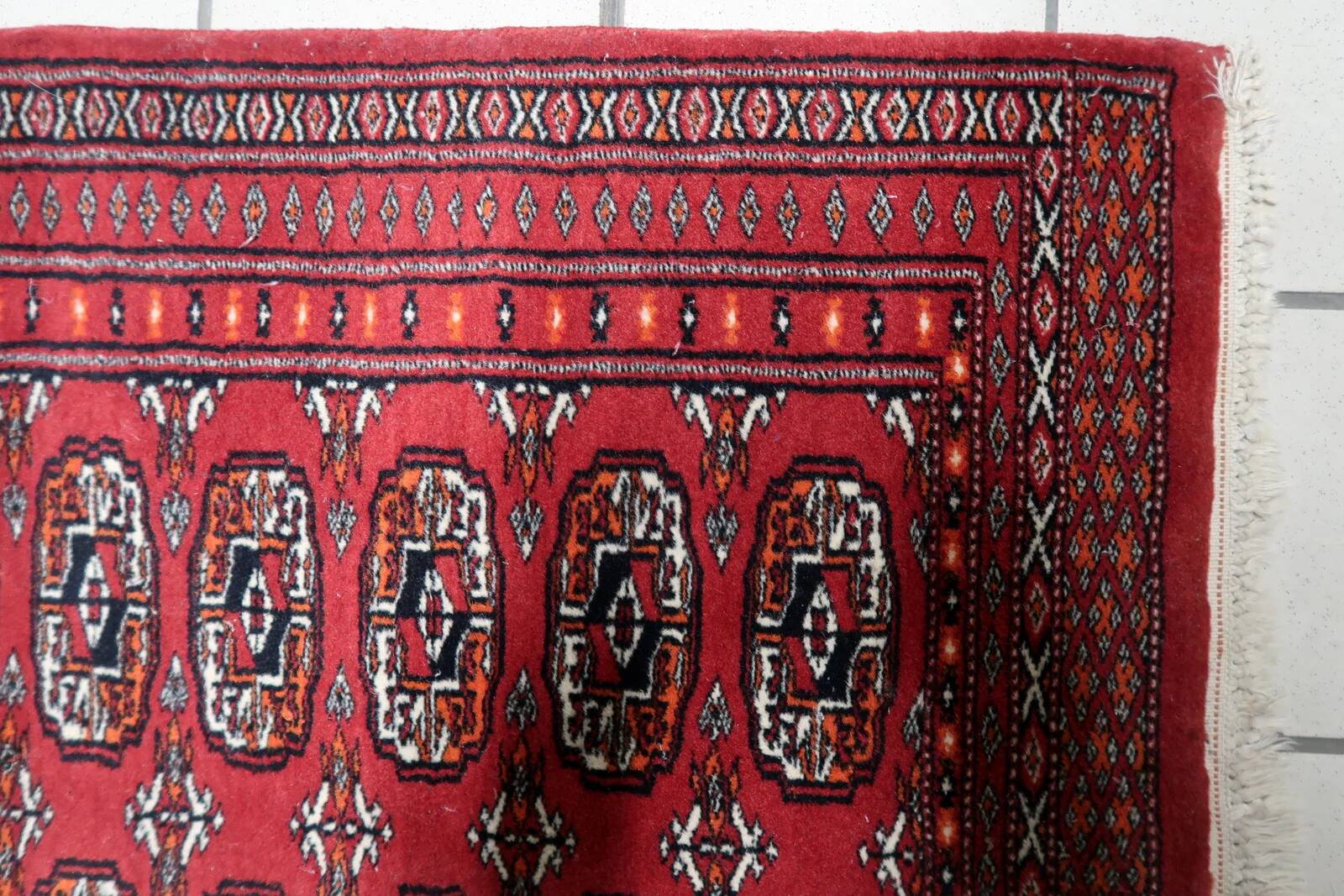 Handmade vintage Uzbek Bukhara rug 86cm x 125cm, 1960s