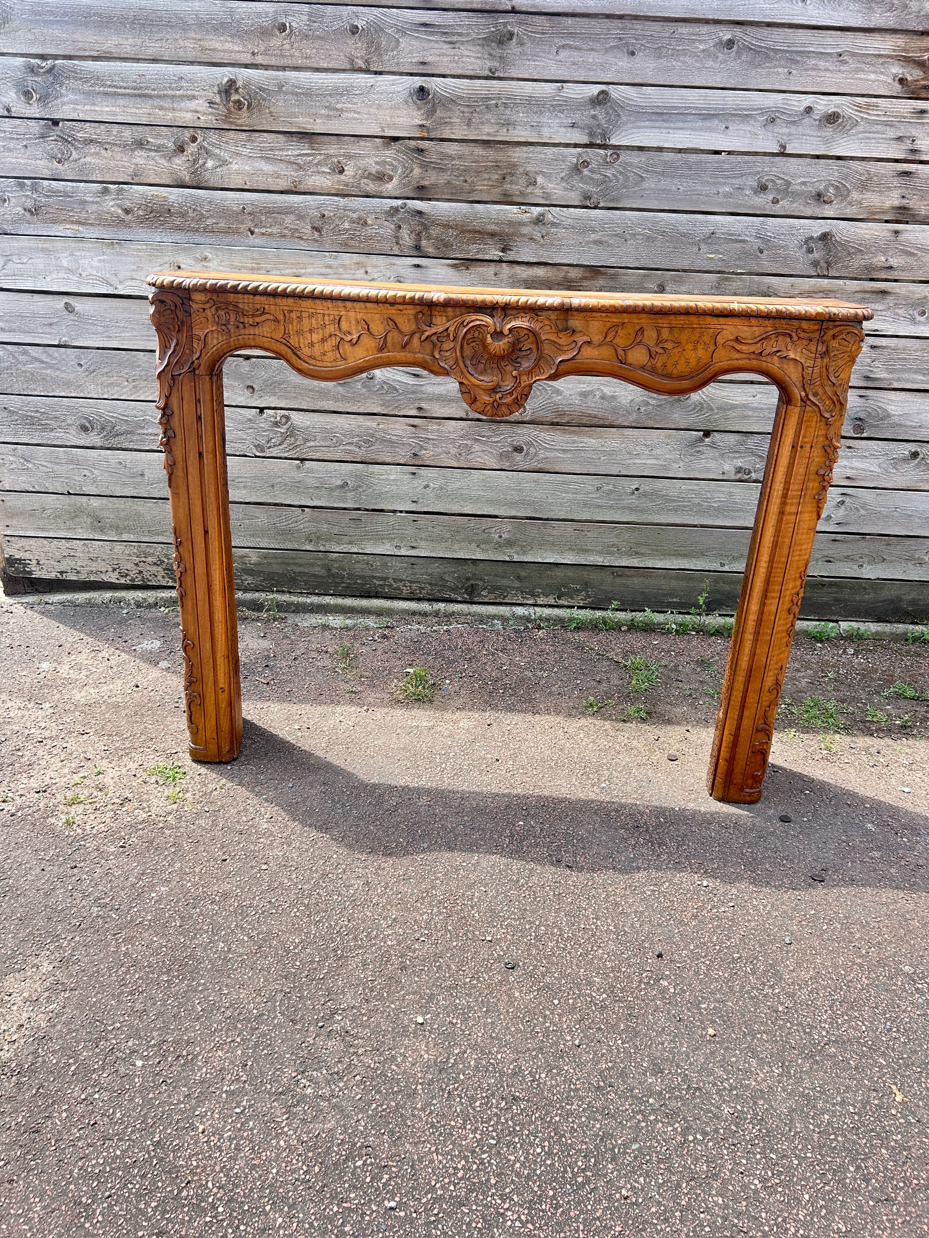 Fireplace surround in Louis XV style woodwork
