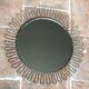 Vintage round sun-shaped mirror in the style of Josef Frank.