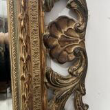 Napoleon III style mirror in carved wood, 20th century.