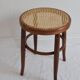 Curved wooden bistro and canne seating