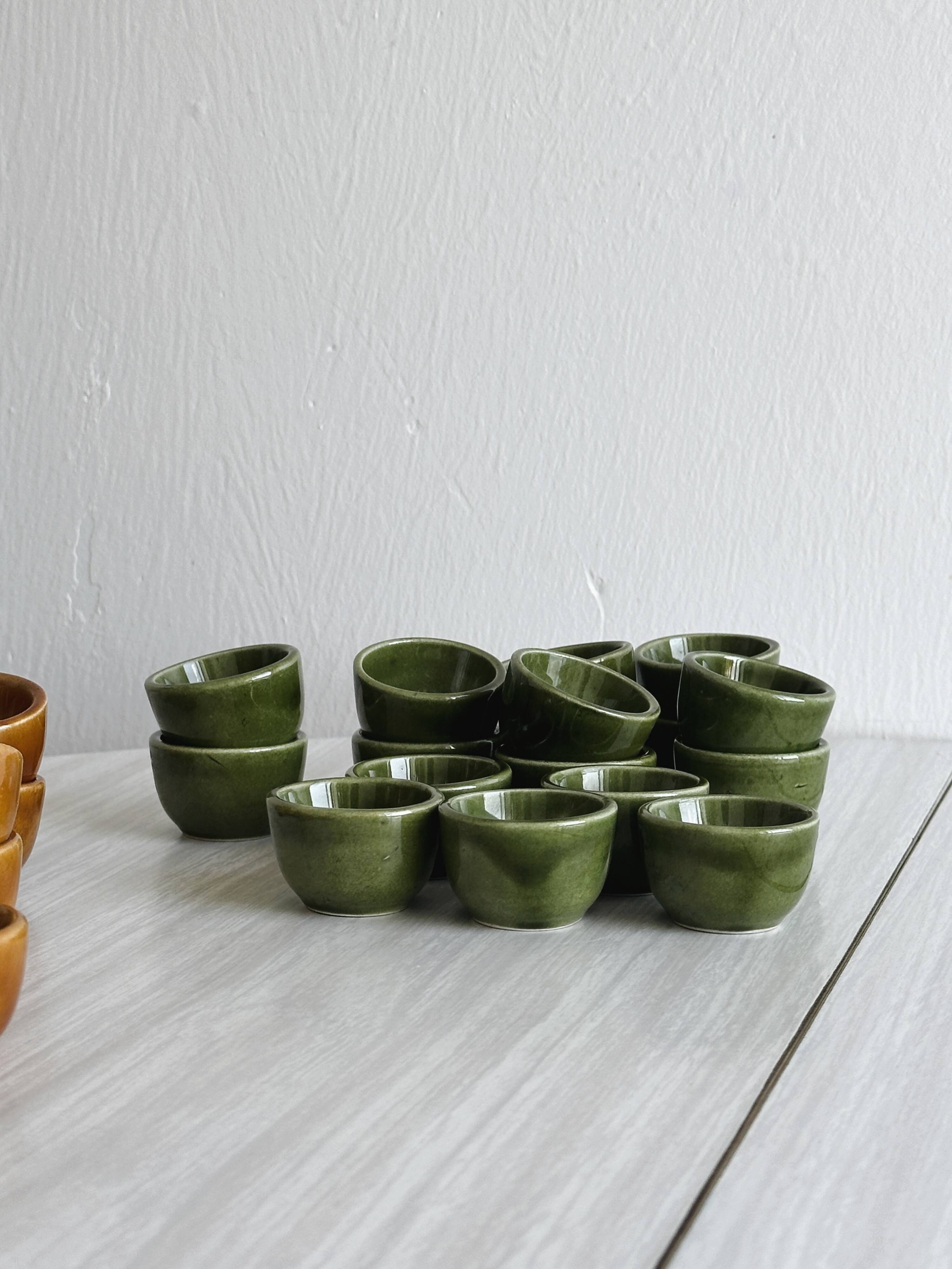 Set of 35 vintage enameled stoneware snail molds